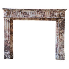 Antique Brocatelle Marble Fireplace in Soft Pink, Peach, and Powder Tones