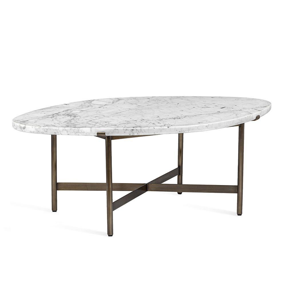 The elegance of Carrara white marble perfectly complements a stainless steel base in a Classic antique bronze finish. This best seller oval coffee table is in stock. 

Since the top is a natural stone, please expect small variations in coloration,