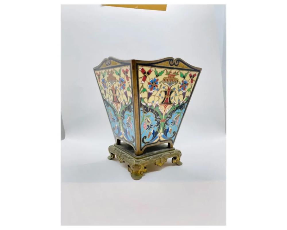 Antique Bronze and Champlevé Enamel vase

In Excellent condition ready to place in your home or office.

Some minor loss to the gilding to the bronze base consistent with age.

The size is approximately 5 inches tall by 4 inches wide at the