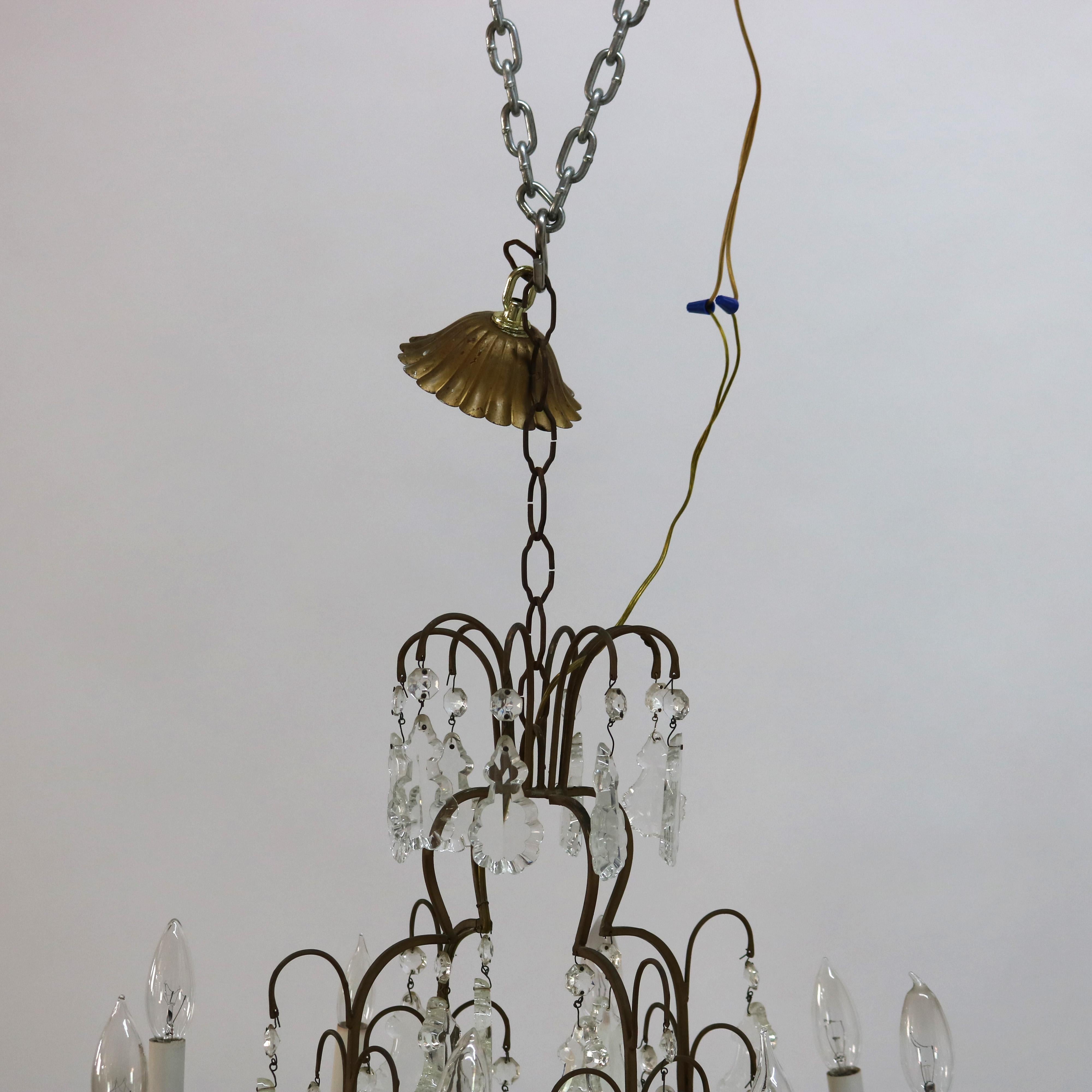20ième siècle Lustre ancien à huit lumières en bronze et cristal taillé C1930 en vente