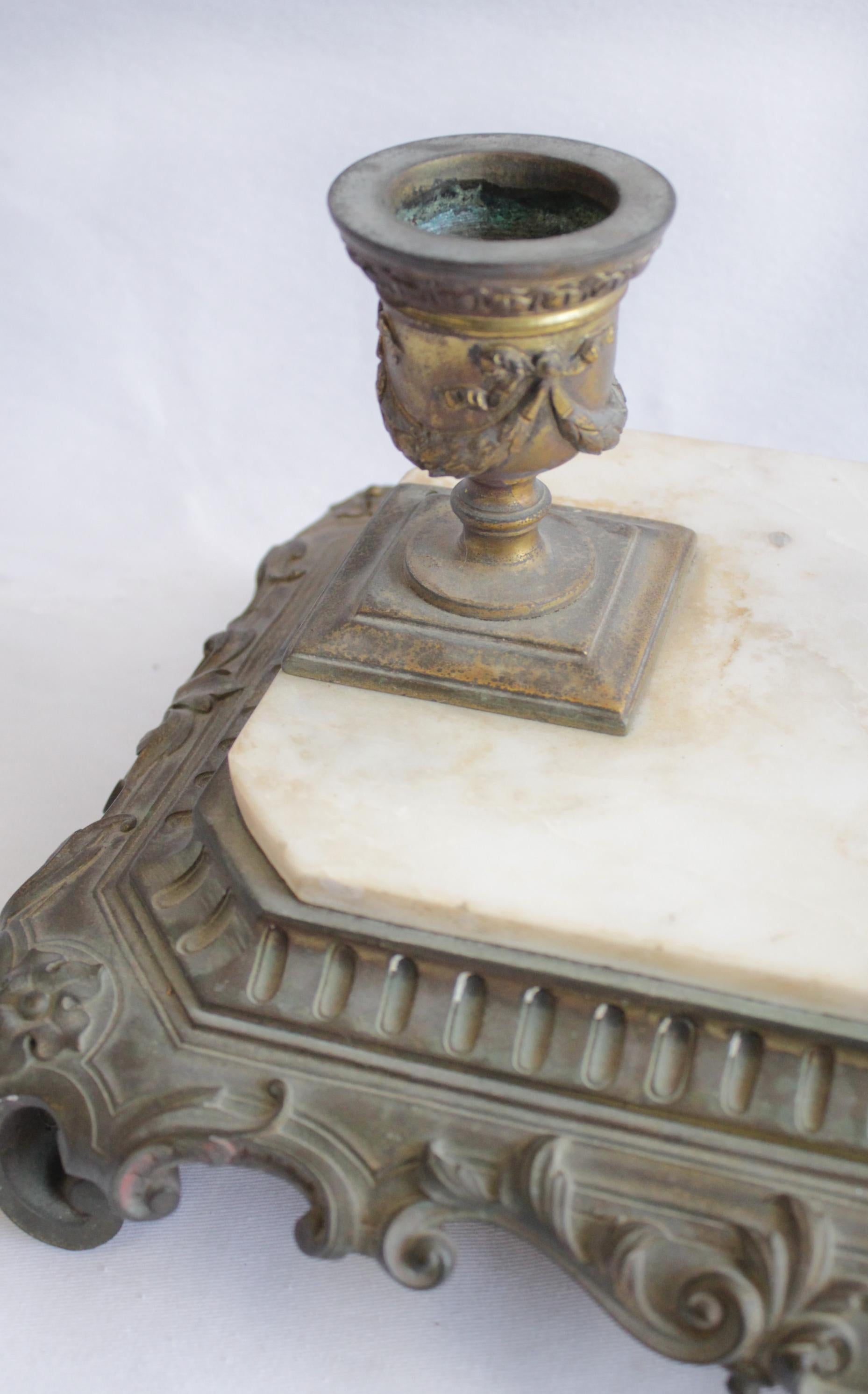 Antique bronze and marble inkwell
Marble is white and grey with some brown coloring. Heavy, beautiful display piece. Bronze has a nice patina.
Measures: 18.5