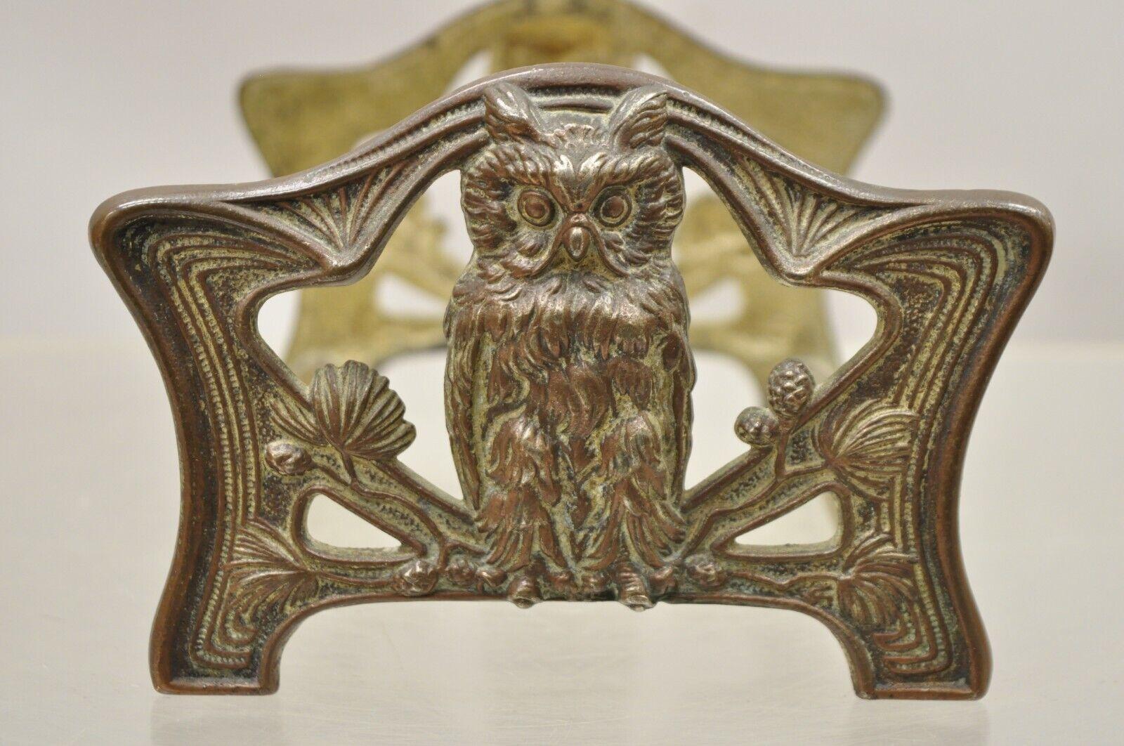 Antique bronze Art Nouveauowl expandable bookends book rack. Item features Metal frame, very nice antique item, quality American craftsmanship, great style and form, circa Early 1900s. Measurements: 4.5