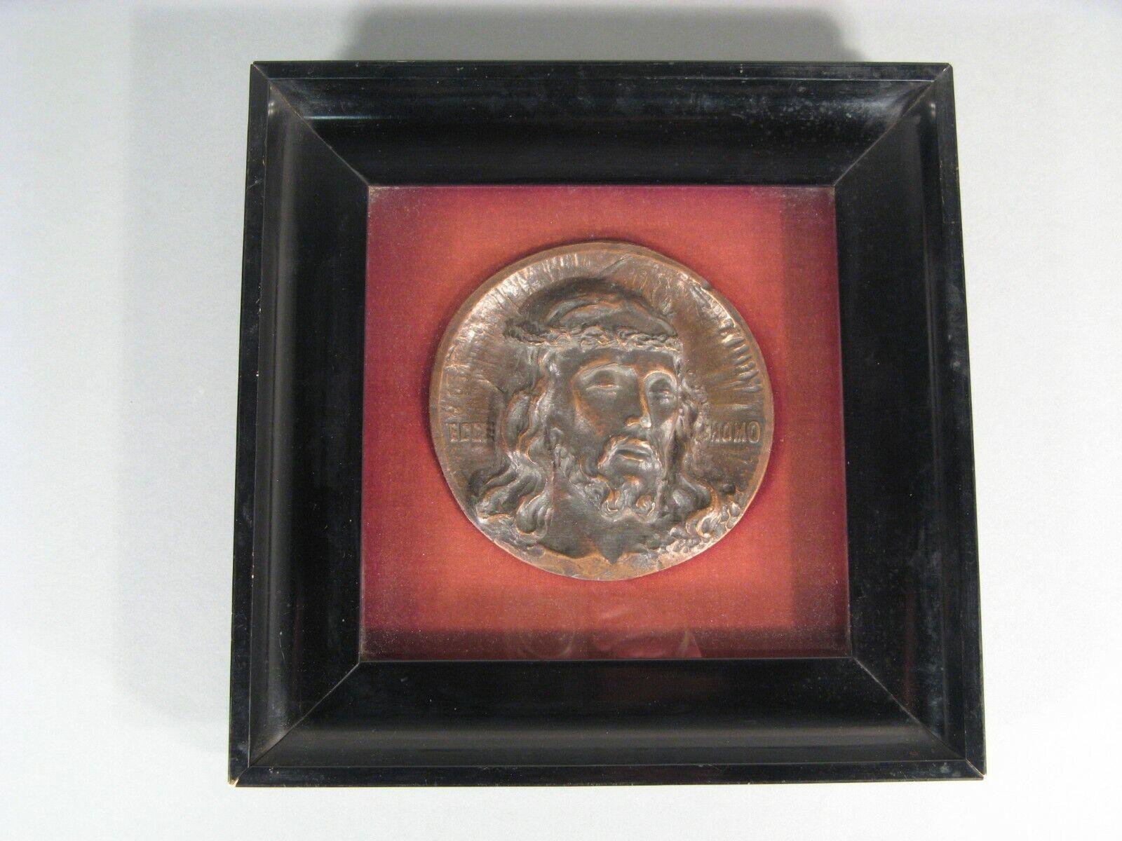 An exquisite antique bronze bas-relief sculpture depicting Christ with a crown of thorns, titled 