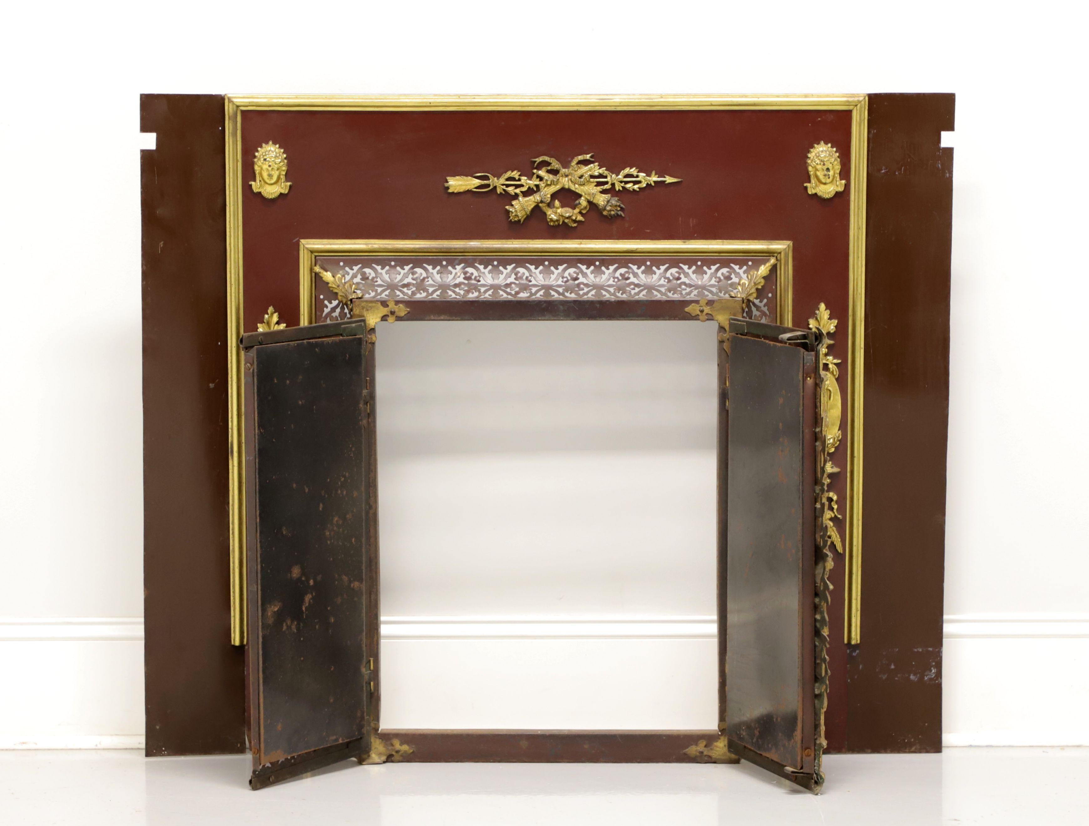 An antique French Provincial style fireplace screen with surround panels, unbranded. Bronze with decorative brass accents. Features dual doors for access to fireplace, decorative vents around the doors to allow heat to escape when doors are closed