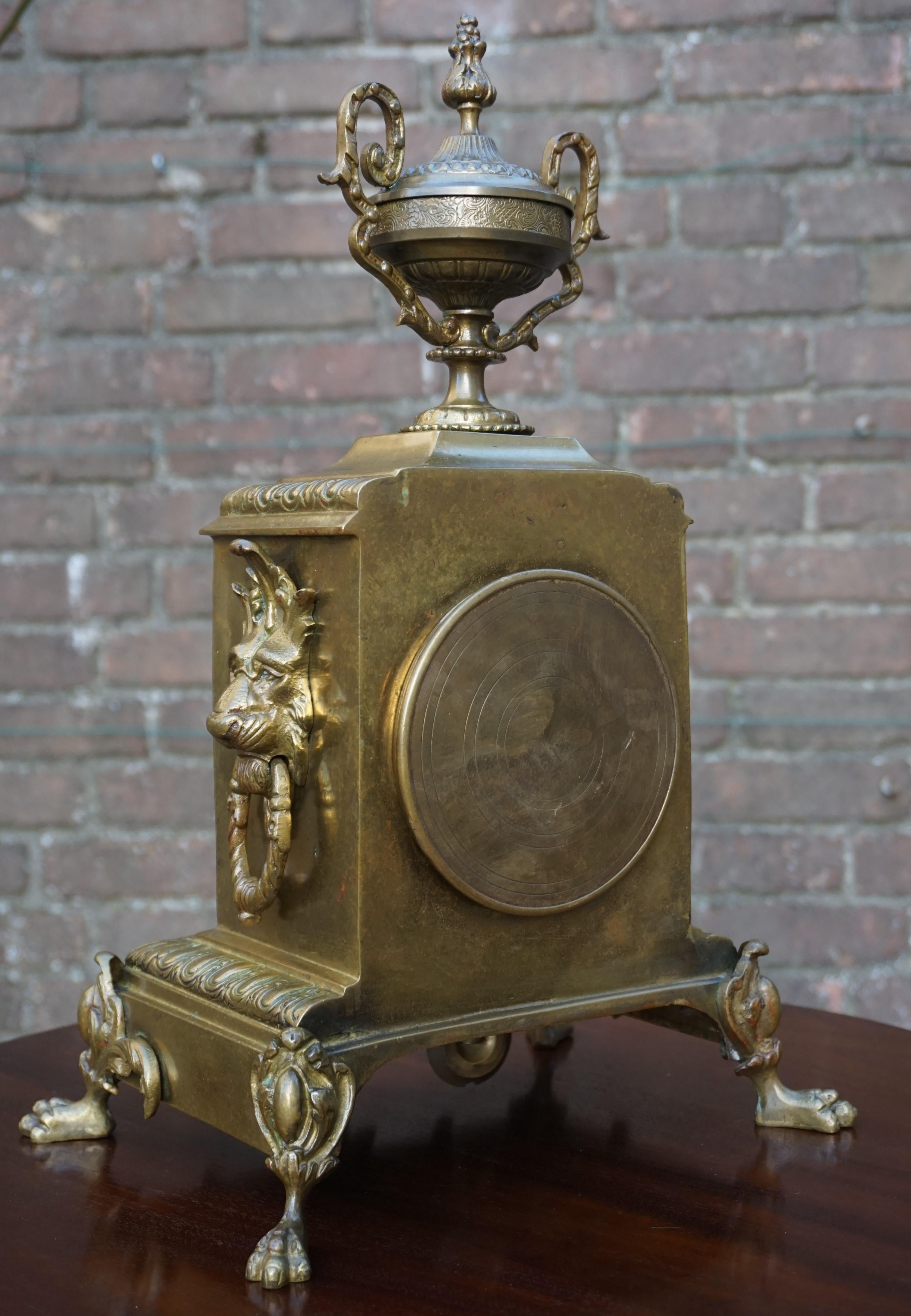 19th Century Antique Bronze and Brass Mantel Clock, Enameled Roman Numerals, Lion Sculptures For Sale