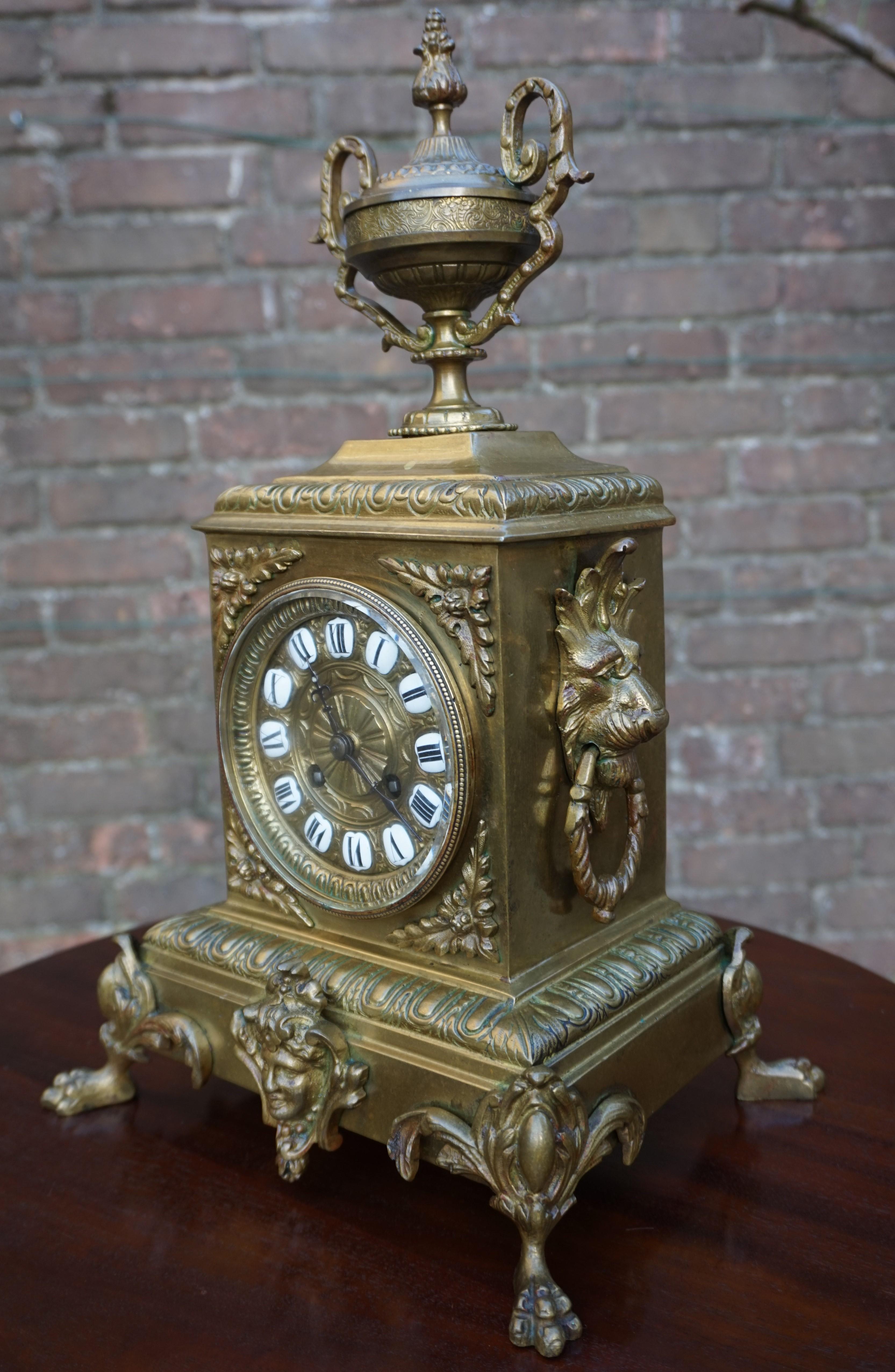 Neoclassical Revival Antique Bronze and Brass Mantel Clock, Enameled Roman Numerals, Lion Sculptures For Sale