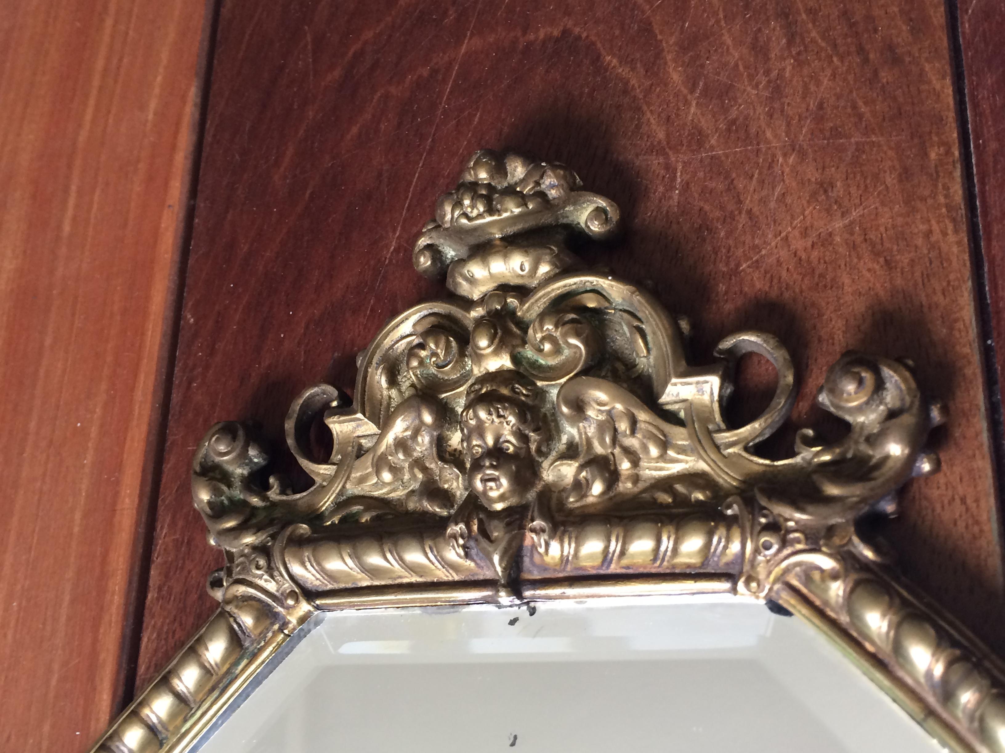 Antique Bronze and Brass Renaissance Revival Wall Mirror, Candleholders, Angel In Excellent Condition In Lisse, NL