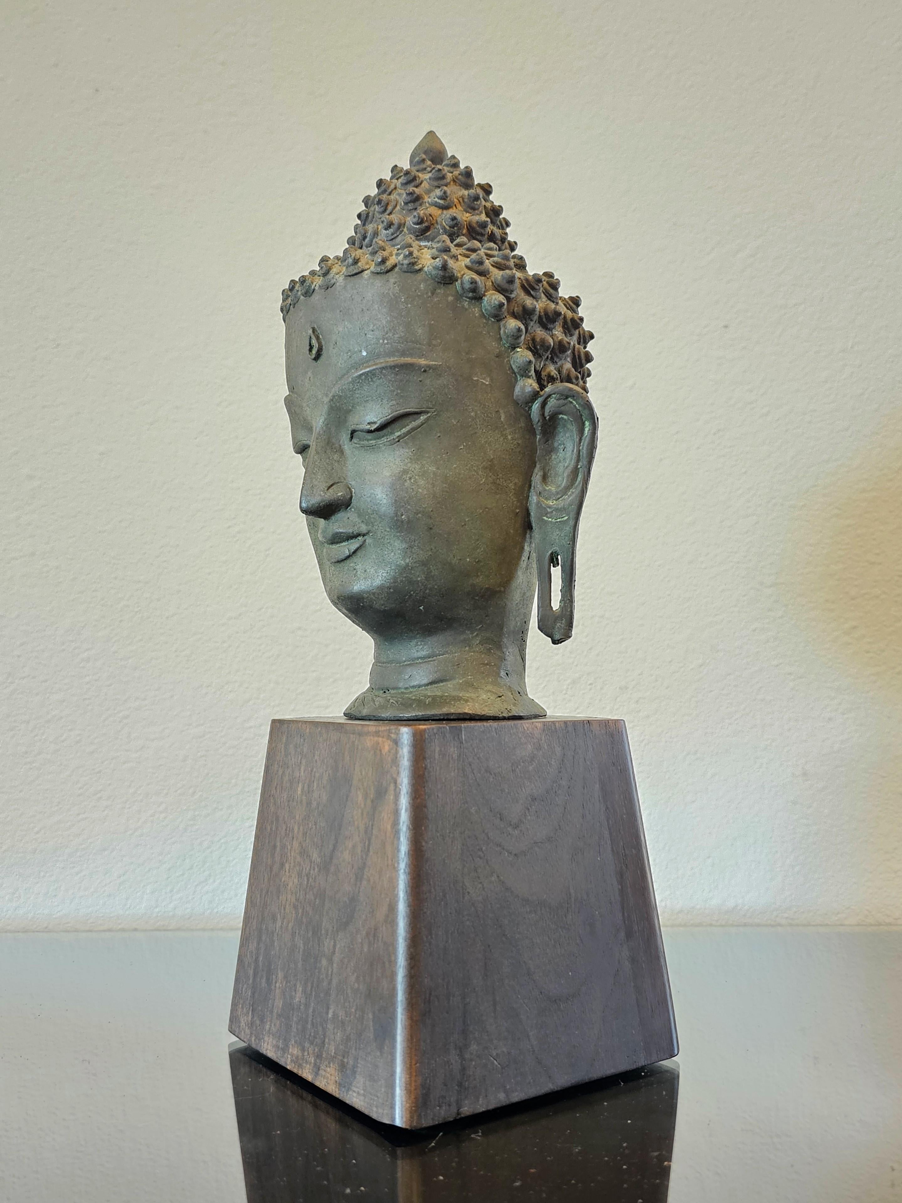 East Asian Antique Bronze Buddha Head on Wood Stand