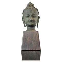 Antique Bronze Buddha Head on Wood Stand