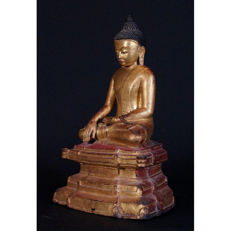 Material: bronze
42 cm high 
28 cm wide - 19 cm deep
Weight: 6.927 kgs
Gilded with 24 krt. gold
Ava style
Bhumisparsha mudra
Originating from Burma
17th century.

