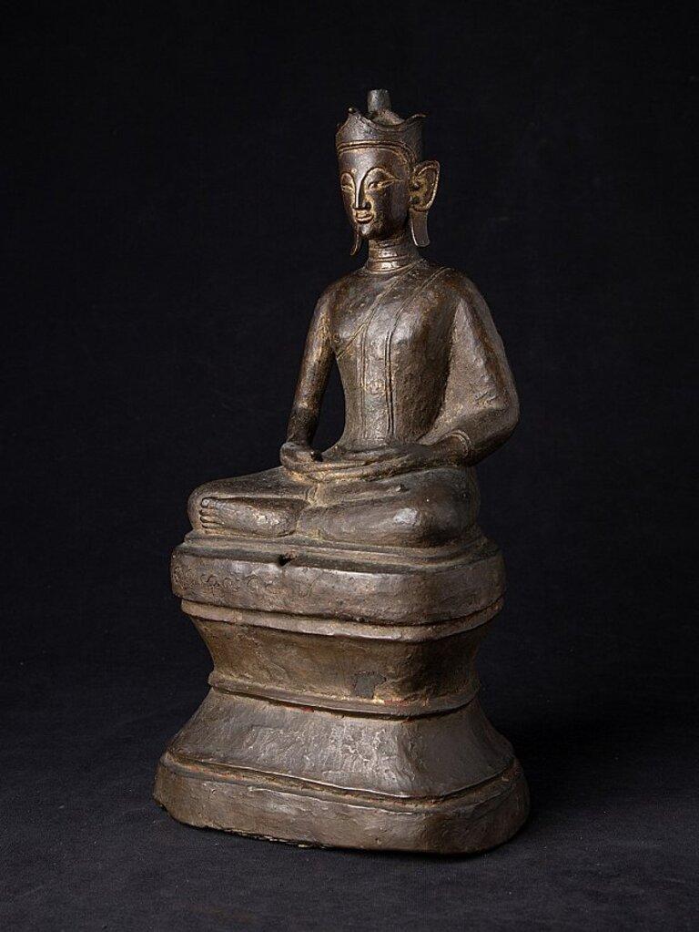 Material: bronze
34,8 cm high 
19 cm wide and 14,2 cm deep
Weight: 4.492 kgs
With traces of 24 krt. gold
Mon style
Dhyana mudra
Originating from Burma
15-16th century
Special !
 