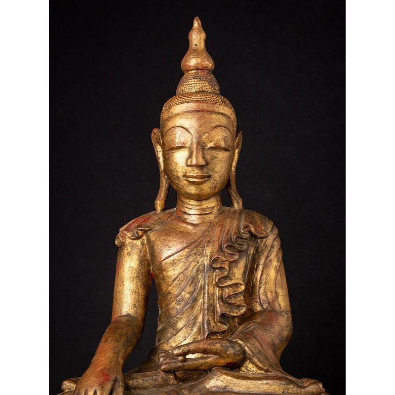 Material: bronze
Measures: 55 cm high 
31,5 cm wide and 22,8 cm deep
Weight: 17.15 kgs
Regilded with 24 krt. gold in the late 20th century
Shan (Tai Yai) style
Bhumisparsha mudra
Originating from Burma
19th century.

