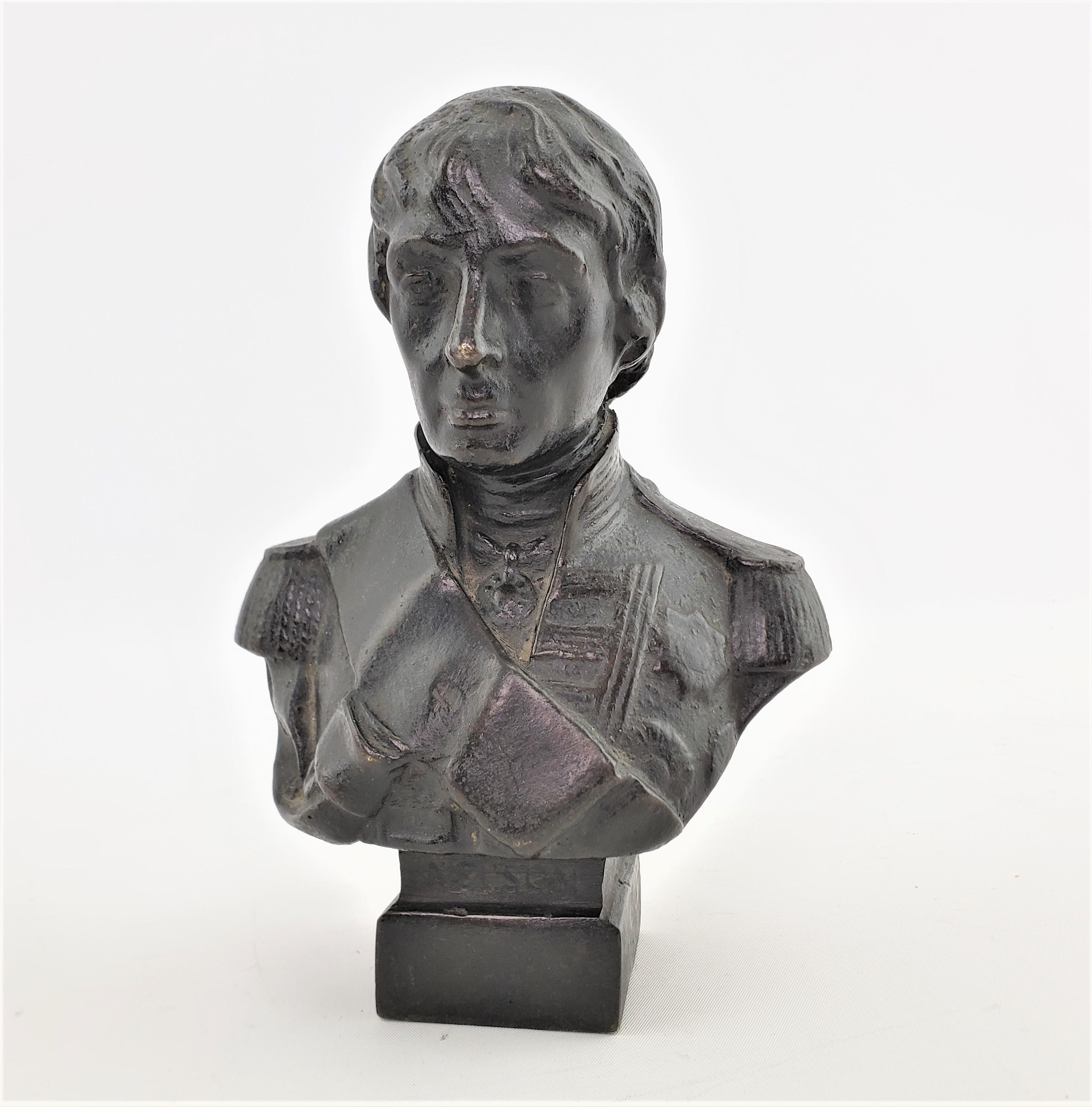 This antique cast bronze bust is unsigned and has no foundry mark, but is presumed to have originated from England and dates to approximately 1890 and done in the period Victorian style. The well executed bronze depicts Admiral Lord Nelson and shows