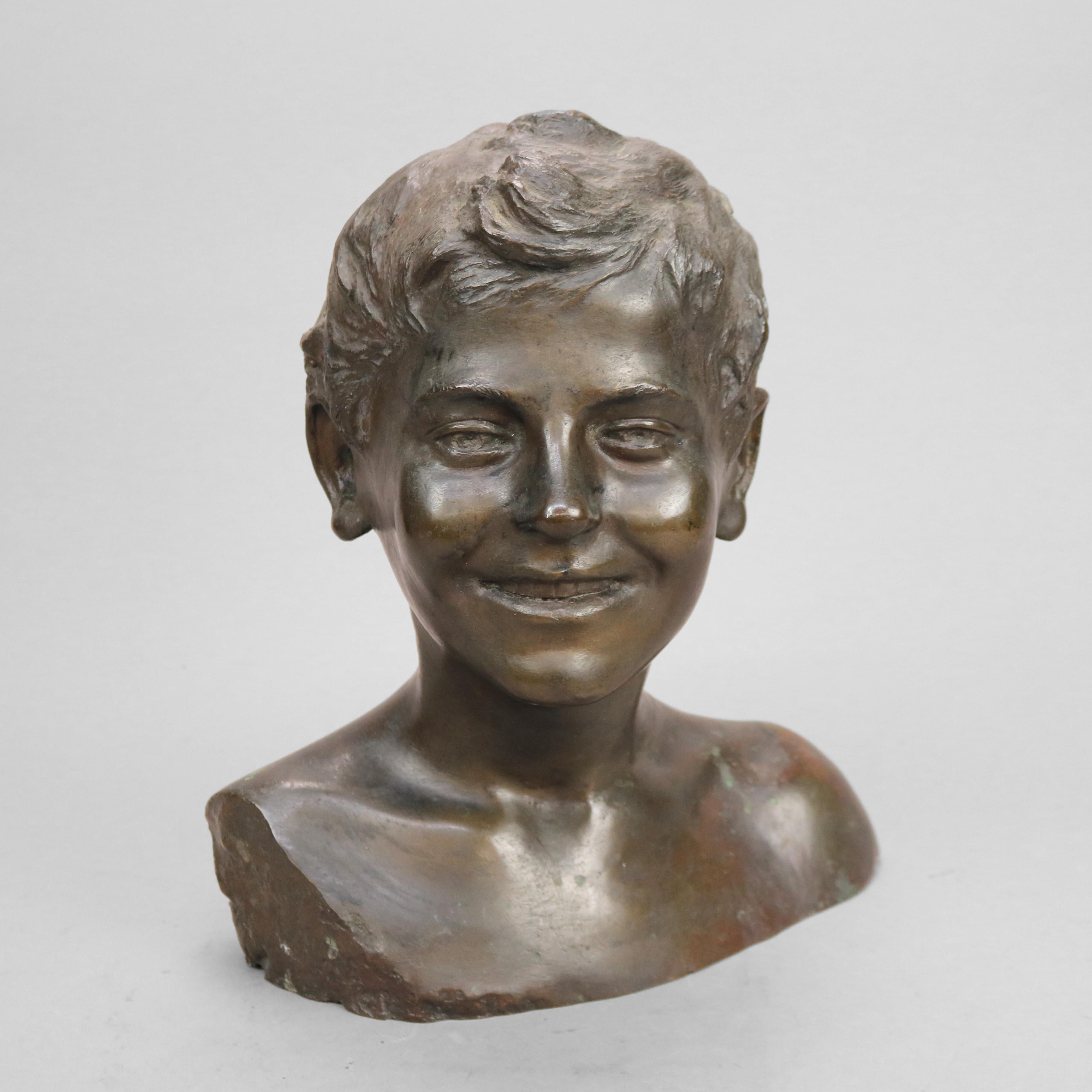 An antique bust sculpture offers cast bronze portrait of a young boy, c1900

Measures - 13.5'' H x 11.5'' W x 8'' D.

Catalogue Note: Ask about DISCOUNTED DELIVERY RATES available to most regions within 1,500 miles of New York.