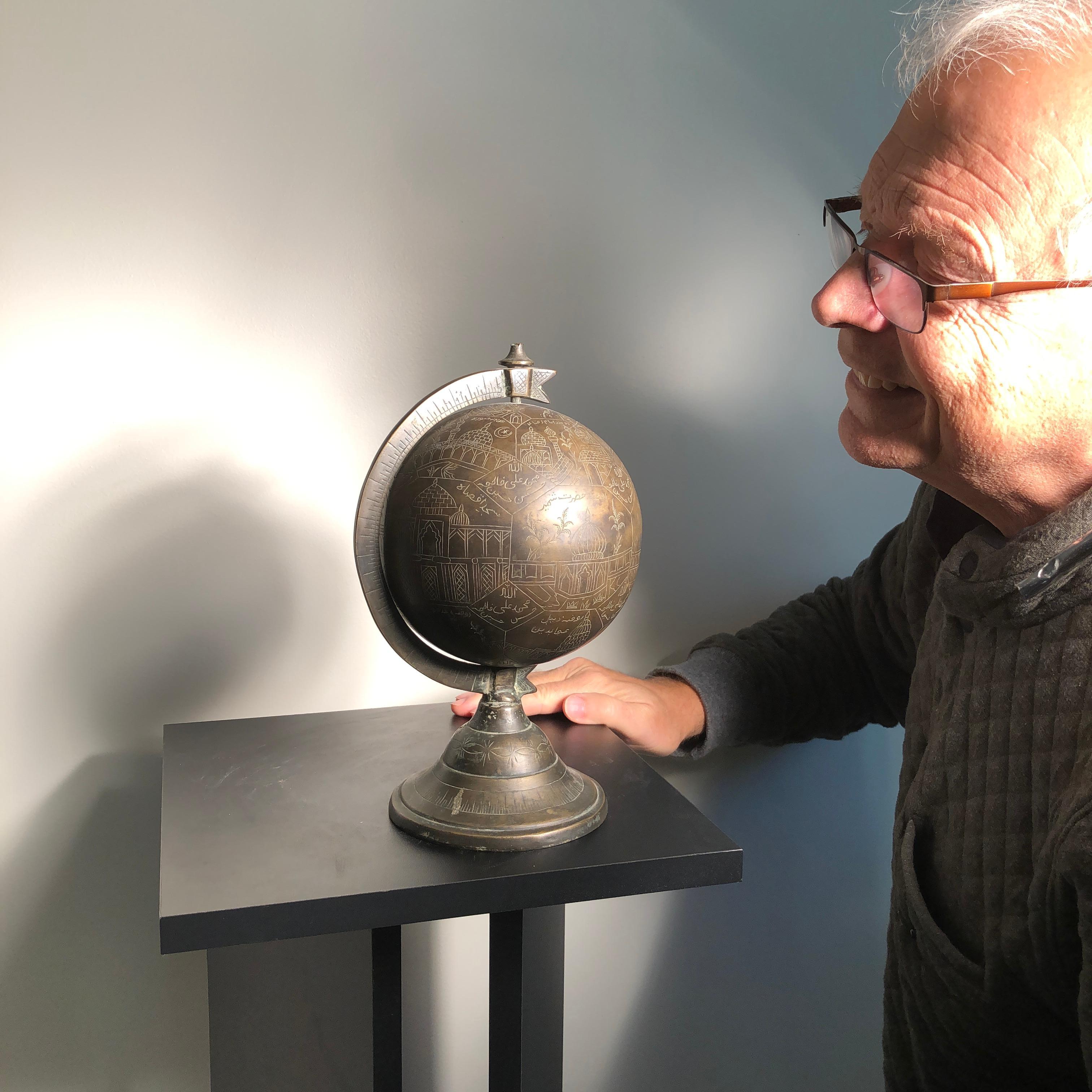An unusual one-of-a-kind bronze globe or sphere Intricately engraved in commemoration of the holy sites of Islam , India, early 20th century. 

Provenance: Old Massachusetts collection collected in Mumbai 1960s 

Sites mentioned or referred to in