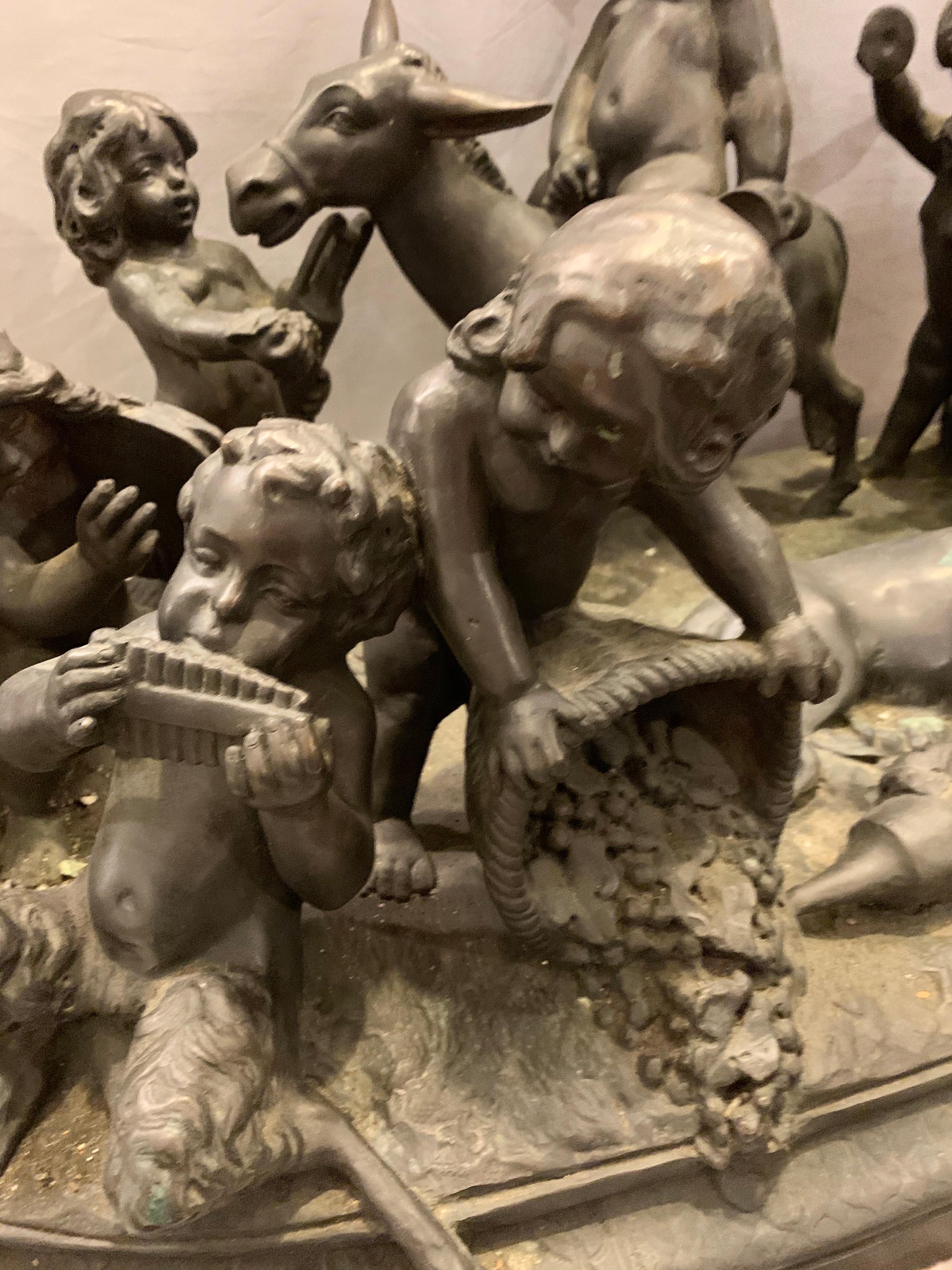 Belle Époque Antique Bronze Cherub Group Sculpture or Centerpiece of Drunken Playing Cherubs