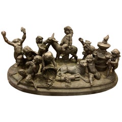 Antique Bronze Cherub Group Sculpture or Centerpiece of Drunken Playing Cherubs