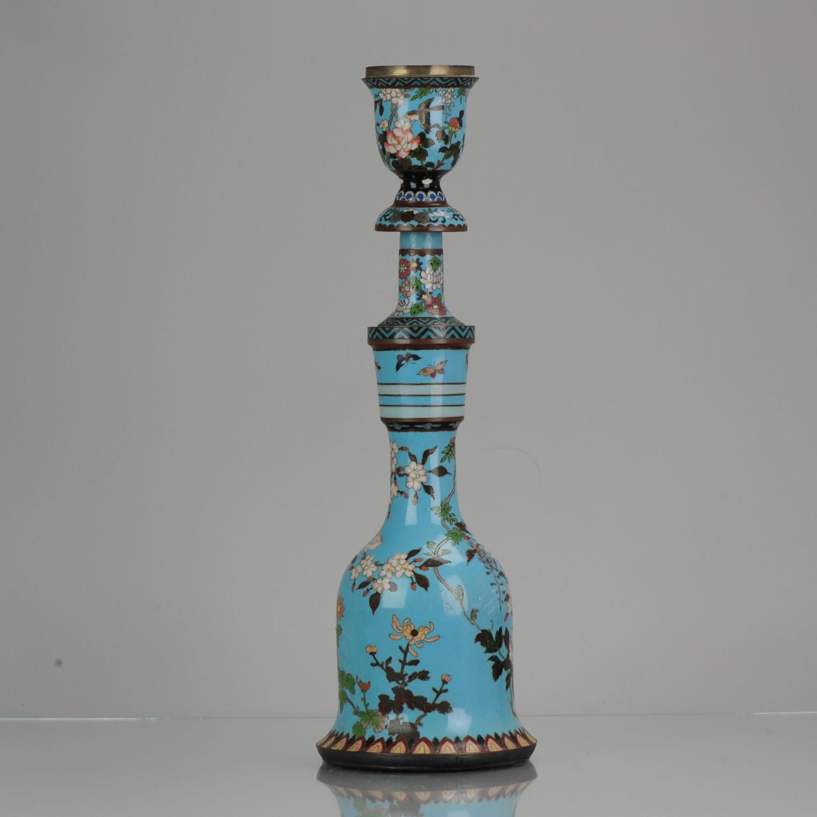 A Cloisonné Hookah Base, Japan, Meiji Period (1868-1912)

Decorated with butterflies, birds, peony, prunus and wisteria all on a blue ground.

 

Condition
/ Overall condition some crackle line close to be base and the upper part is either