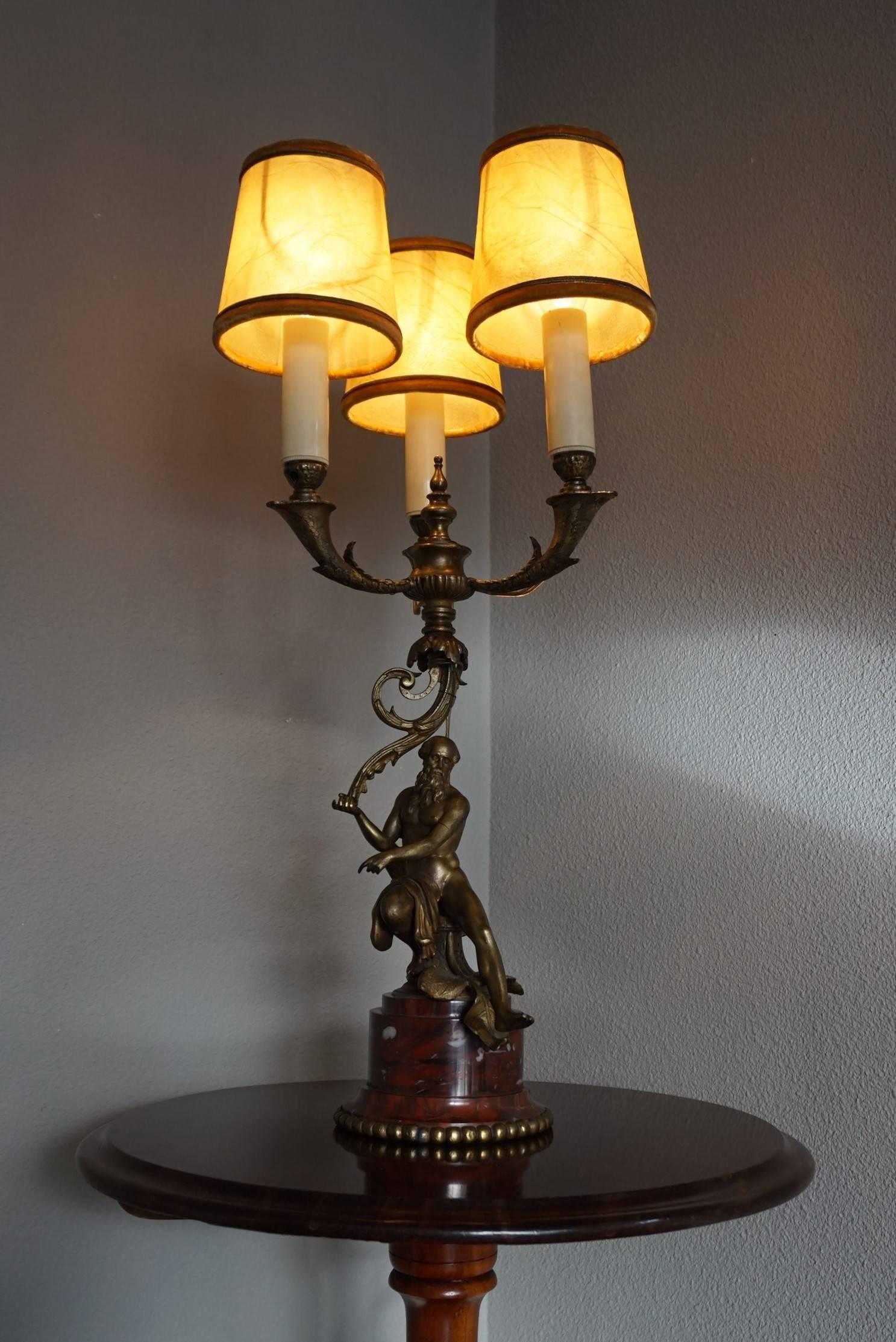 French Antique Bronze Empire Style Table Lamp with a Nude Zeus Sculpture on Marble Base For Sale