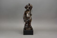 Antique Bronze Figure of a Cherub Holding a Wheat Sheaf
