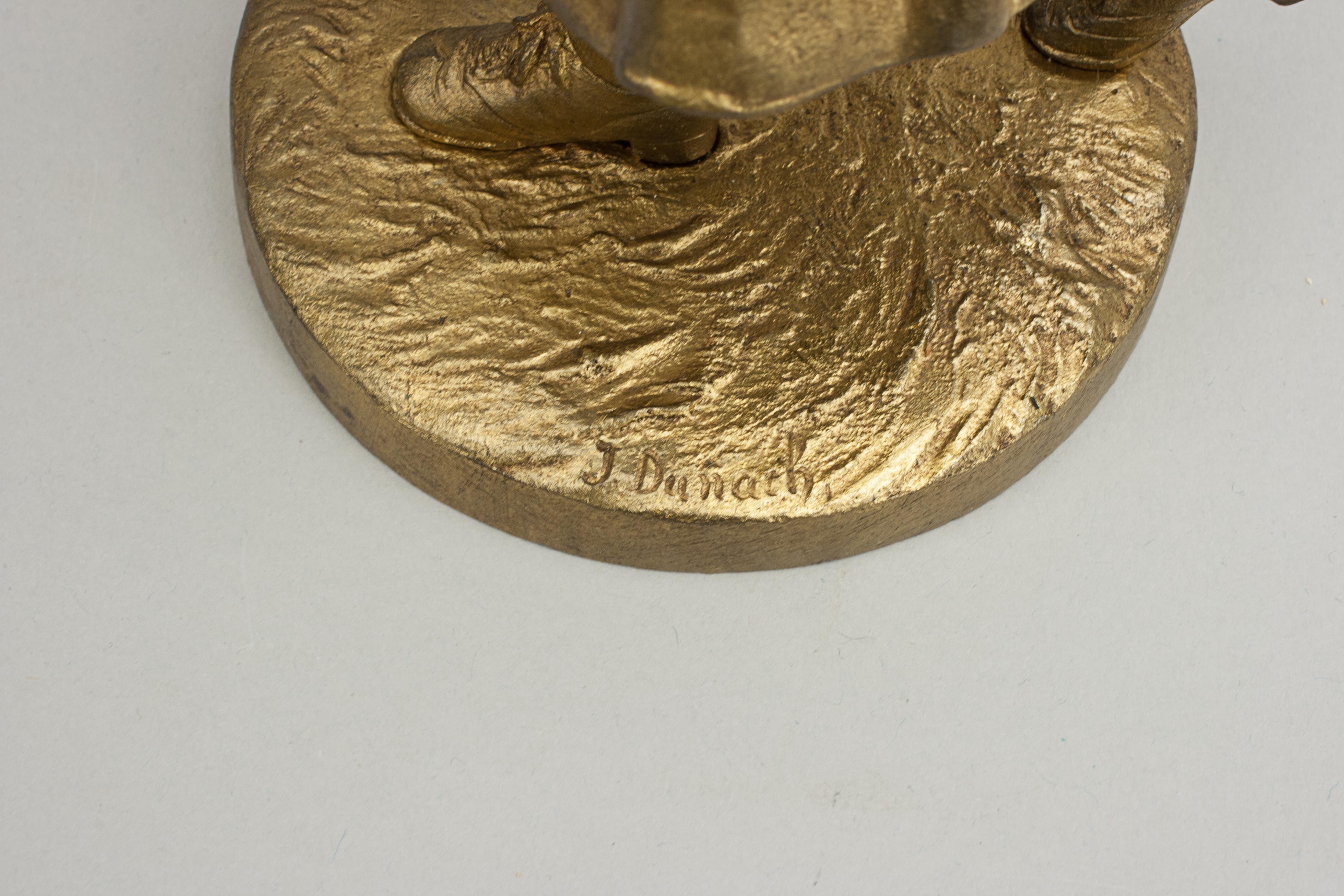 Bronze Figure ancienne d'une golfeuse en vente