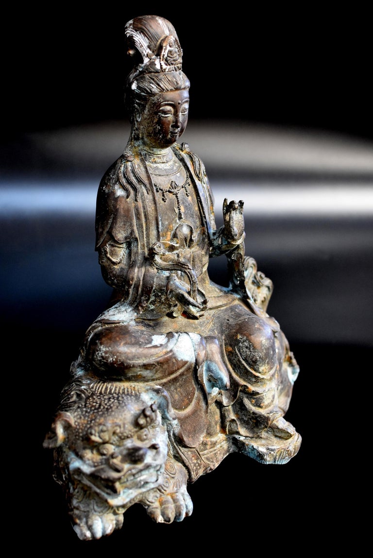 Antique Bronze Guan Yin Buddha Statue on Foo Dog at 1stDibs