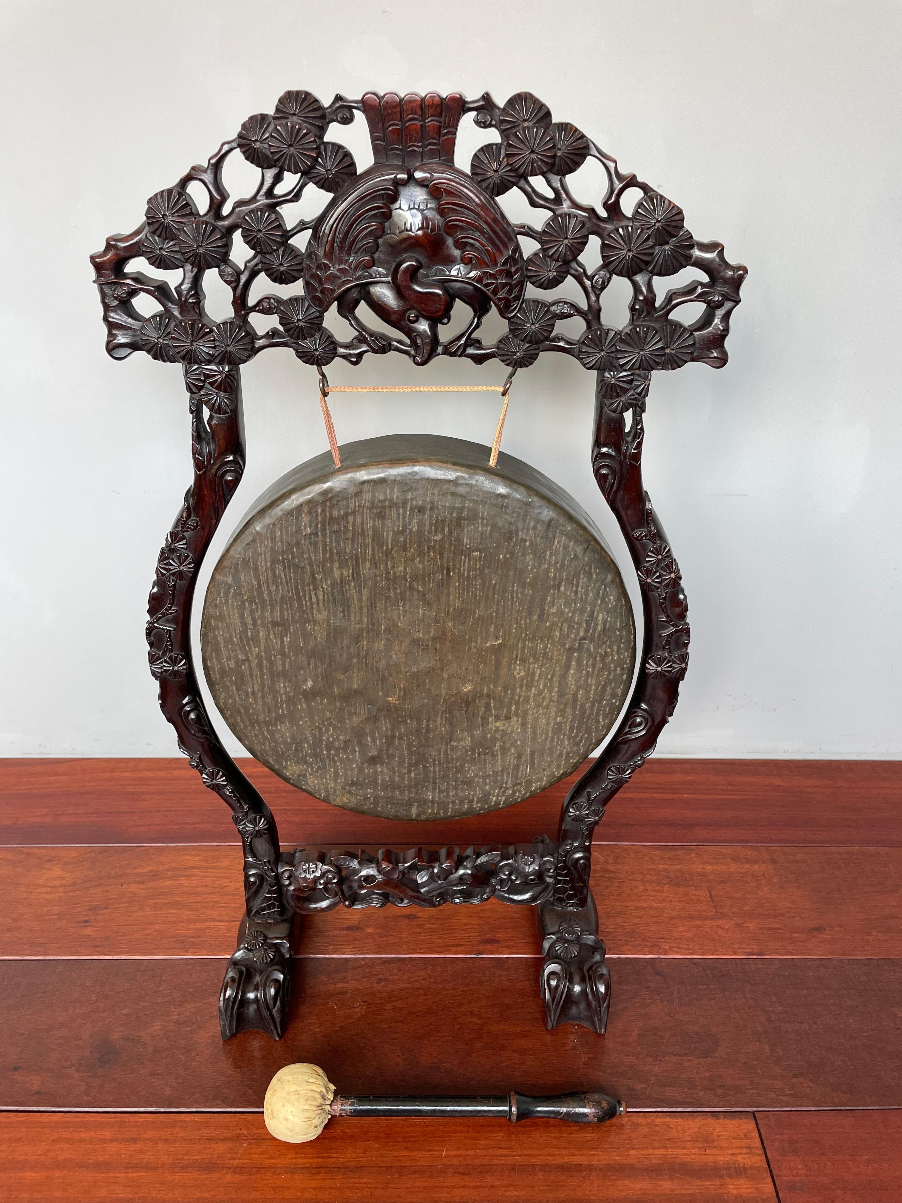 Rare, striking (no pun intended) and top quality workmanship, antique Chinese gong with hammer.

This hand-crafted Chinese gong from the early 1900s is both practical to use and beautiful to look at. The large bronze gong itself is wonderfully