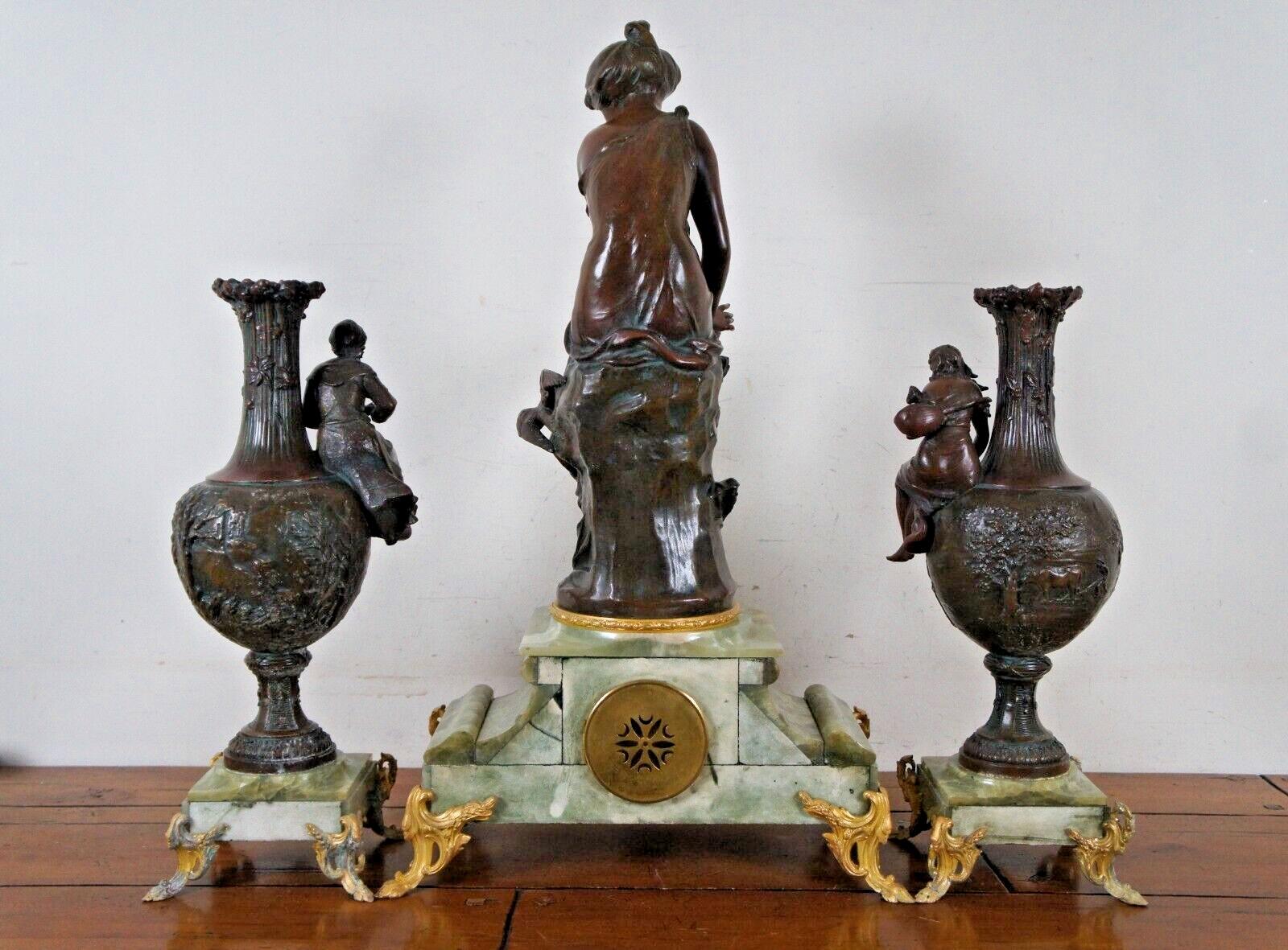 20th Century Antique Bronze Hirondelle Blessee Alfred Foretay Garniture Mantel Clock & Urns For Sale