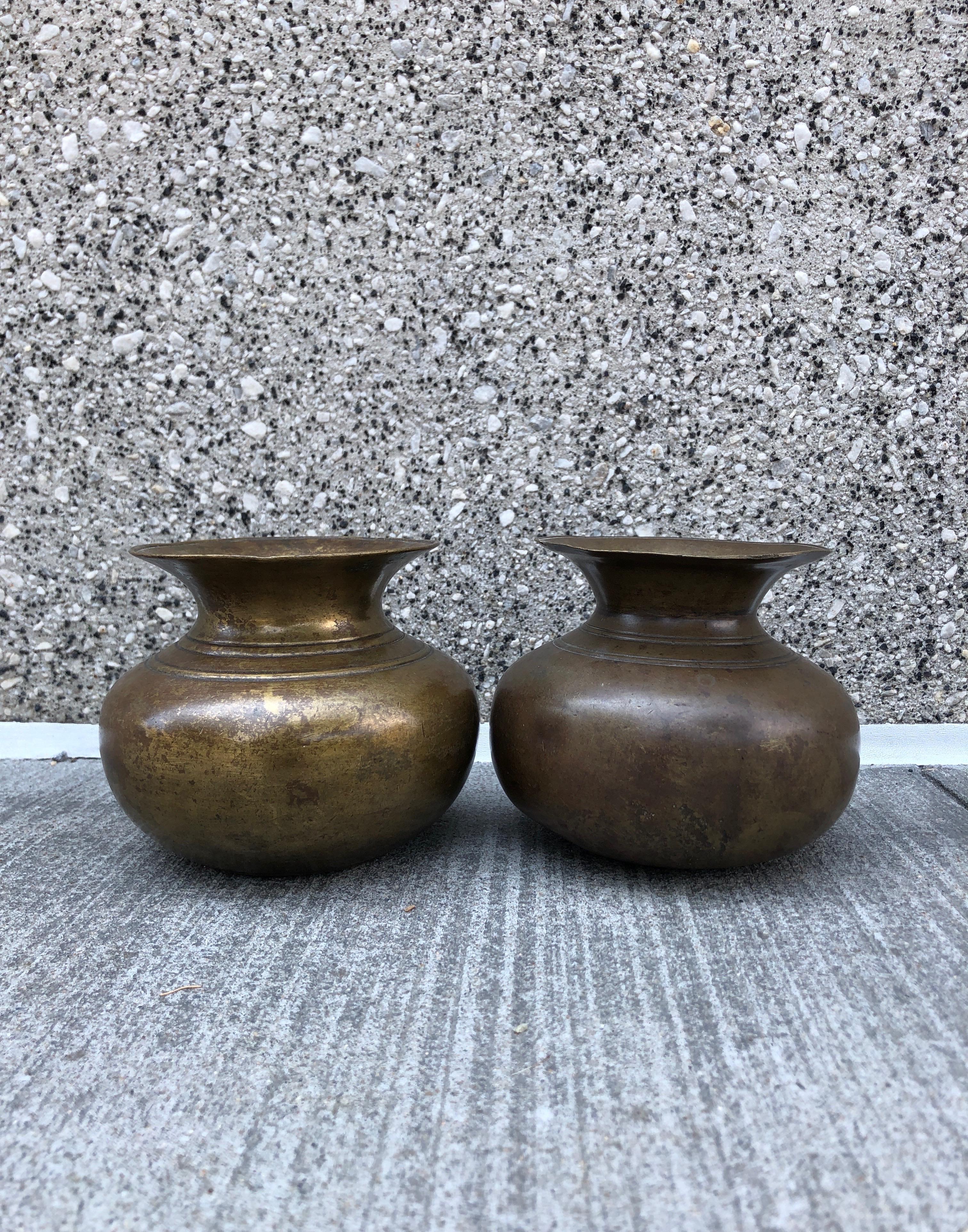 Two simple and classic antique bronze holy water containers from Nepal.
Both heavy bronze with great patina. Gorgeous, spiritual pieces. 
Priced and sold individually.
 