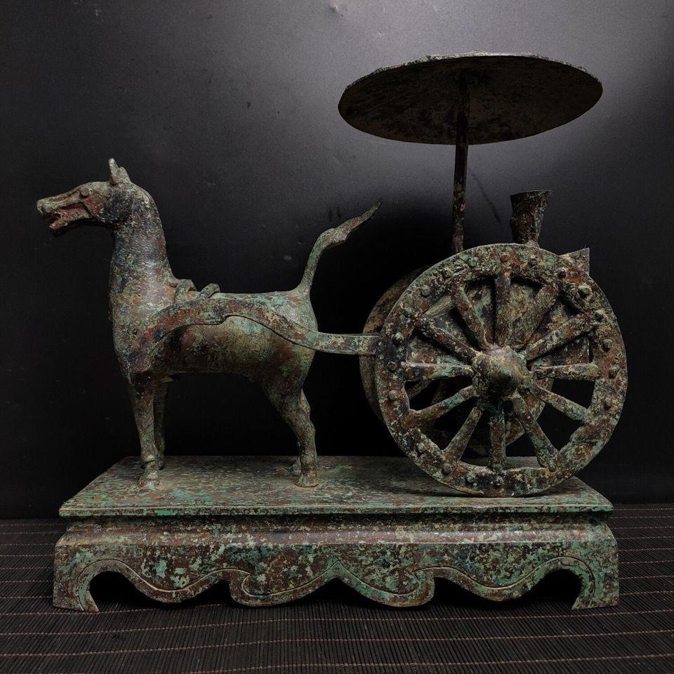 This ancient bronze horse drawn cart is really a special art from China, well preserved.

Statue details:
Material: bronze
Height: 28cm
Length: 31cm
Width: 14cm
Weight: 2.7kg
Originating from China

Free shipping worldwide