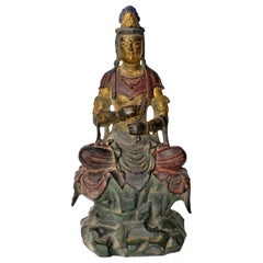 Statue de Kwan Yin en bronze ancien:: enseignement