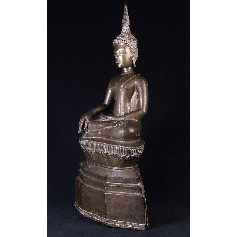 Material: bronze
53,5 cm high 
27 cm wide and 15 cm deep
Bhumisparsha mudra
Originating from Laos
16-17th century
With a high silver content mixed in the aloy
For sure the best Laos Buddha statue in my collection !
Very rare and special !

