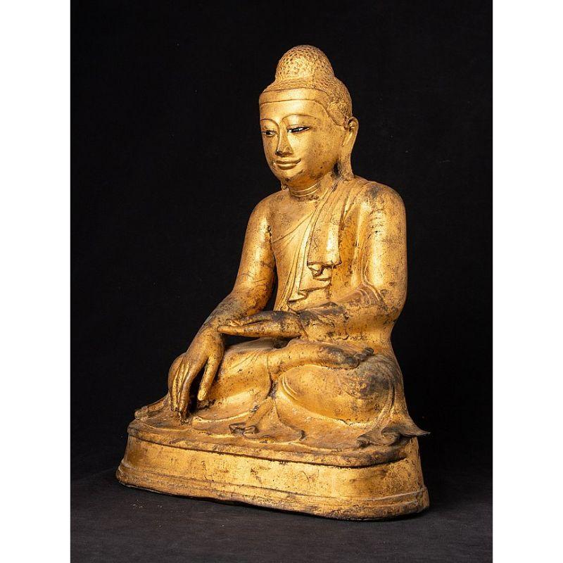 Material: bronze
42 cm high 
31,3 cm wide and 22,4 cm deep
Weight: 11.5 kgs
Gilded with 24 krt. gold
Mandalay style
Bhumisparsha mudra
Originating from Burma
19th century
With inlayed eyes.


