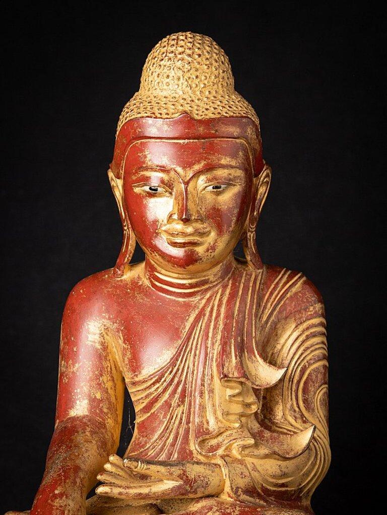 Material: bronze
45,8 cm high 
36,5 cm wide and 25,7 cm deep
Weight: 12 kgs
With traces of 24 krt. gilding
Mandalay style
Bhumisparsha mudra
Originating from Burma
19th century
With inlayed eyes
With Burmese inscriptions in the base, most