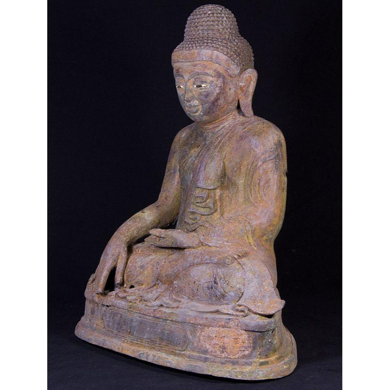 Material: bronze
55 cm high 
45 cm wide and 27 cm deep
Weight: 15.25 kgs
Mandalay style
Bhumisparsha mudra
Originating from Burma
Early 20th century
With inlayed eyes

