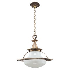 Suspension en bronze antique et verre au lait
