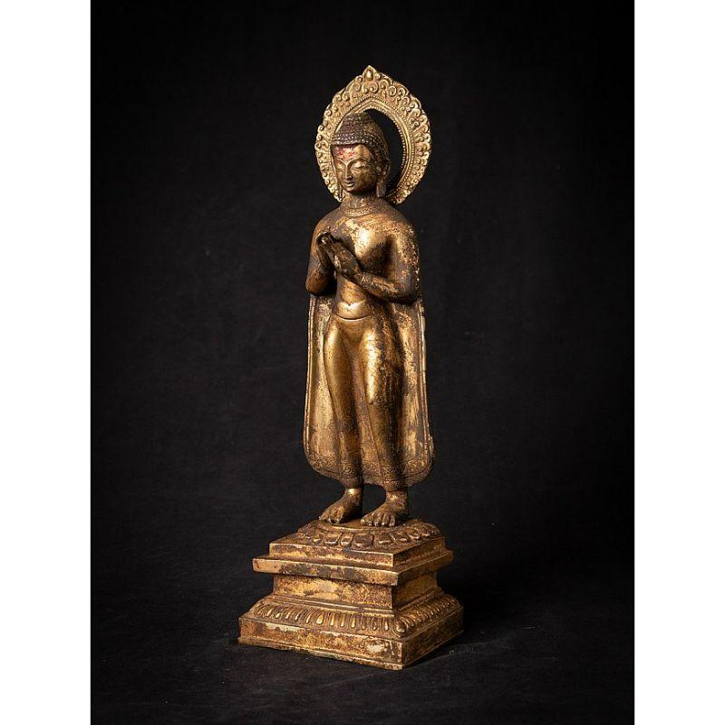 Material: bronze
Measures: 41 cm high 
14 cm wide and 9,7 cm deep
Weight: 3.389 kgs
Fire gilded with 24 krt. gold
Dharmachakra mudra
Originating from Nepal
Late 19th century
High quality !

