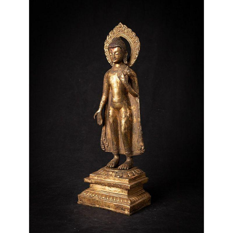 Material: bronze
Measures: 40,9 cm high 
13,8 cm wide and 9,5 cm deep
Weight: 3.594 kgs
Fire gilded with 24 krt. gold
Originating from Nepal
Late 19th century
High quality !

