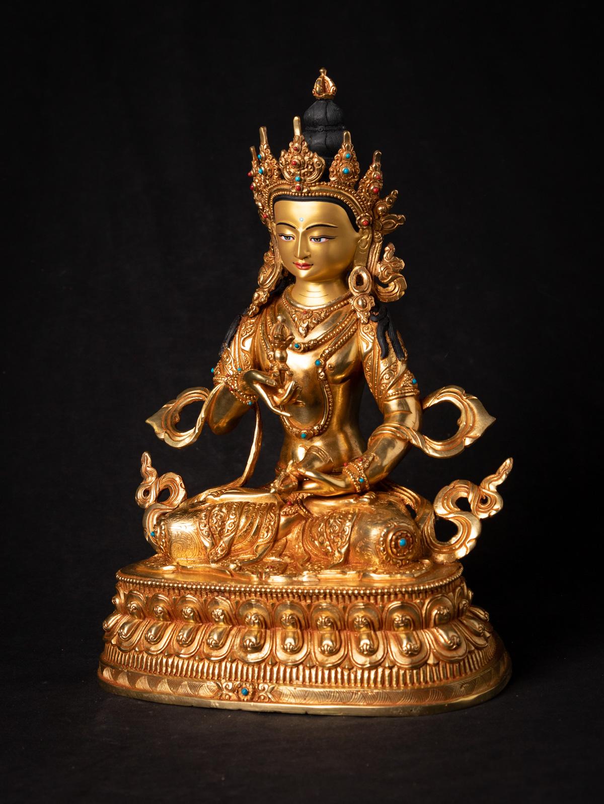 Material: bronze.
Measures: 32,4 cm high.
23, 3 cm wide and 16, 2 cm deep.
Weight: 3.733 kgs.
Fire gilded with 24 krt. gold - the face is gold painted.
Namaskara mudra.
Originating from Nepal.
Newly made in the highest quality !

 