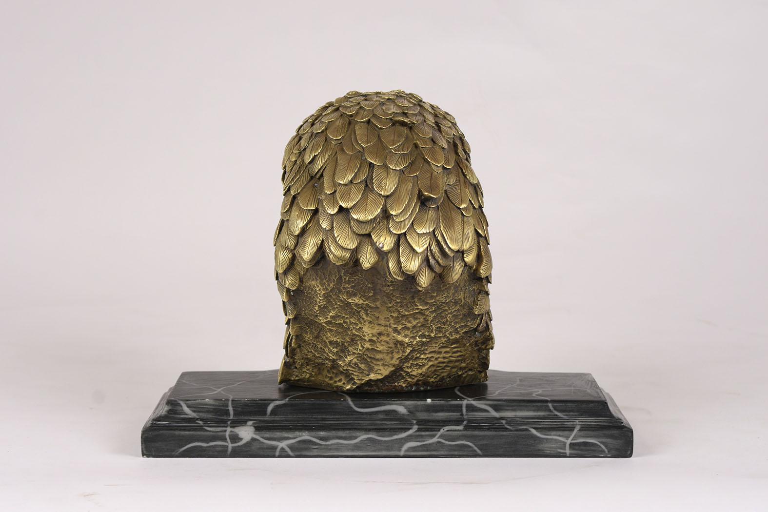 This French Antique Bronze Bust Sculpture of an American Eagle has a remarkable fine detail throughout the piece and resting on a black marble stone base. This French Eagle bust is ready to be used and displayed for years to come.
  
