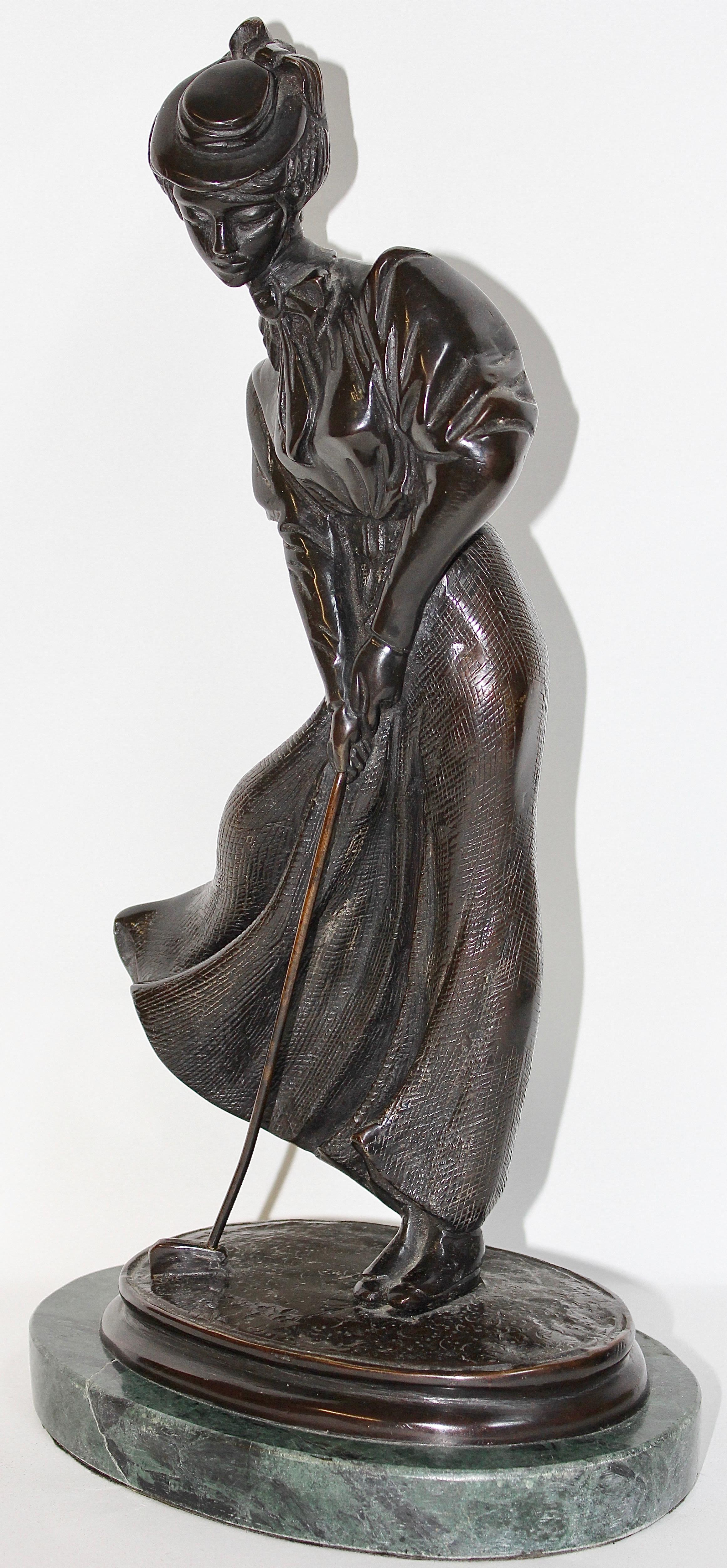 Pretty and decorative antique bronze sculpture.
Elegant lady playing golf.
Bronze on marble base.
Very detailed quality.
