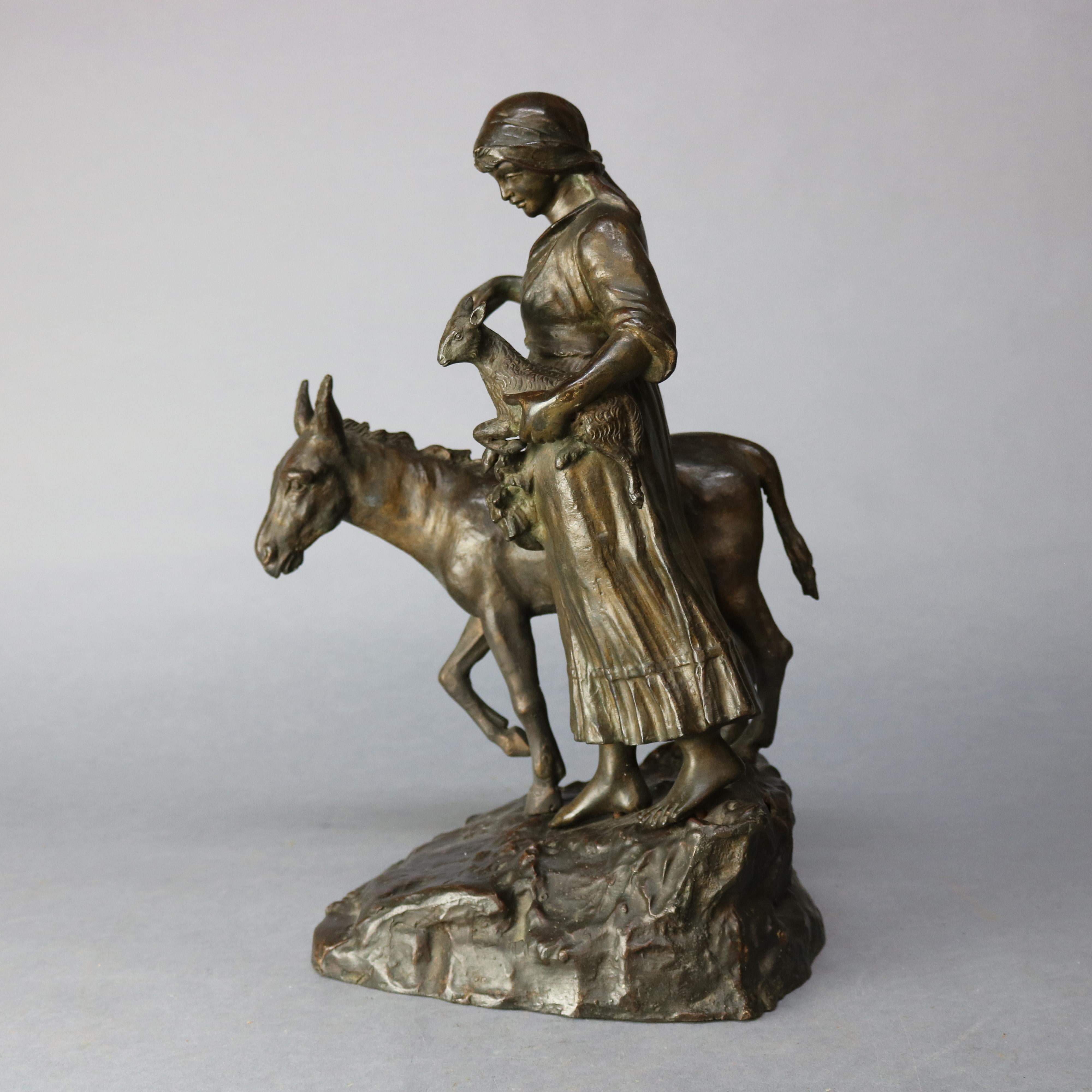 An antique figural bronze sculpture depicts grouping of a barefoot girl carrying her lamb and walking with her donkey in countryside setting, 19th century

Measures: 17.75