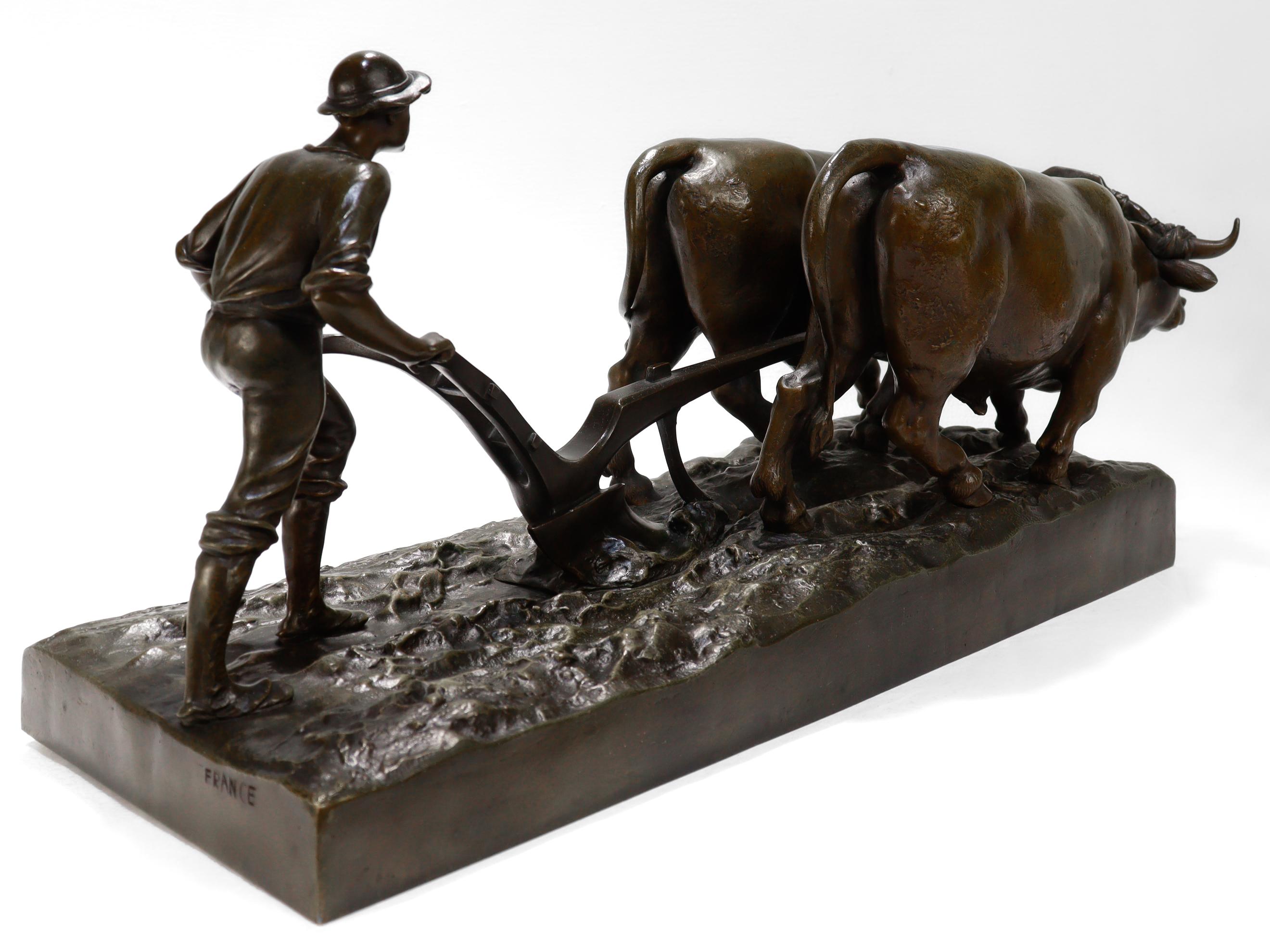 Bronze Sculpture ancienne d'un fermier pliant avec deux chèvres par Marcel Debut en vente