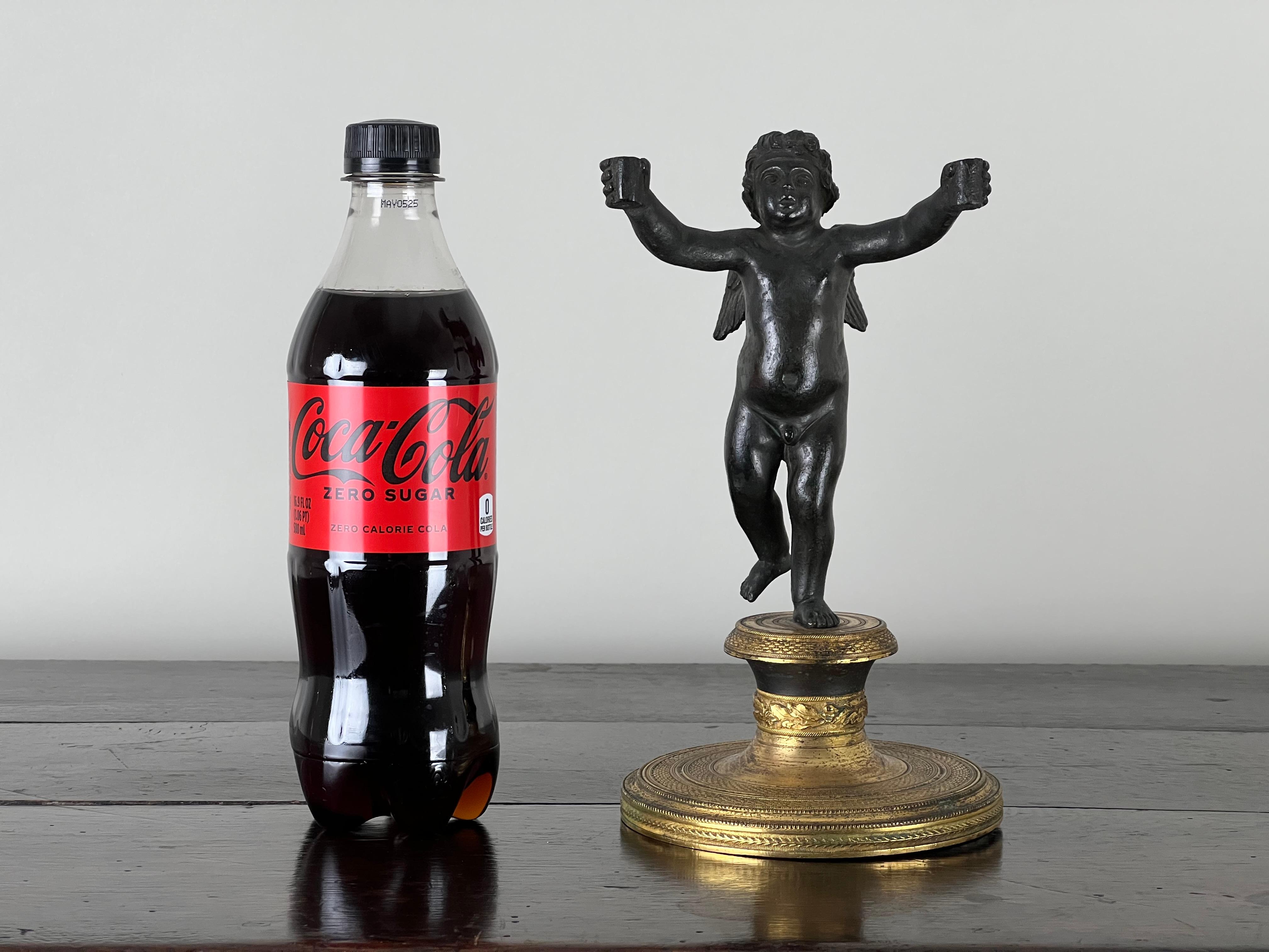 Scultura antica in bronzo di un putti che tiene in mano delle candele Non firmata Attr. Paul Edouard in vendita 1