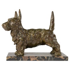 Sculpture ancienne d'un chien écossais - début du 20e siècle