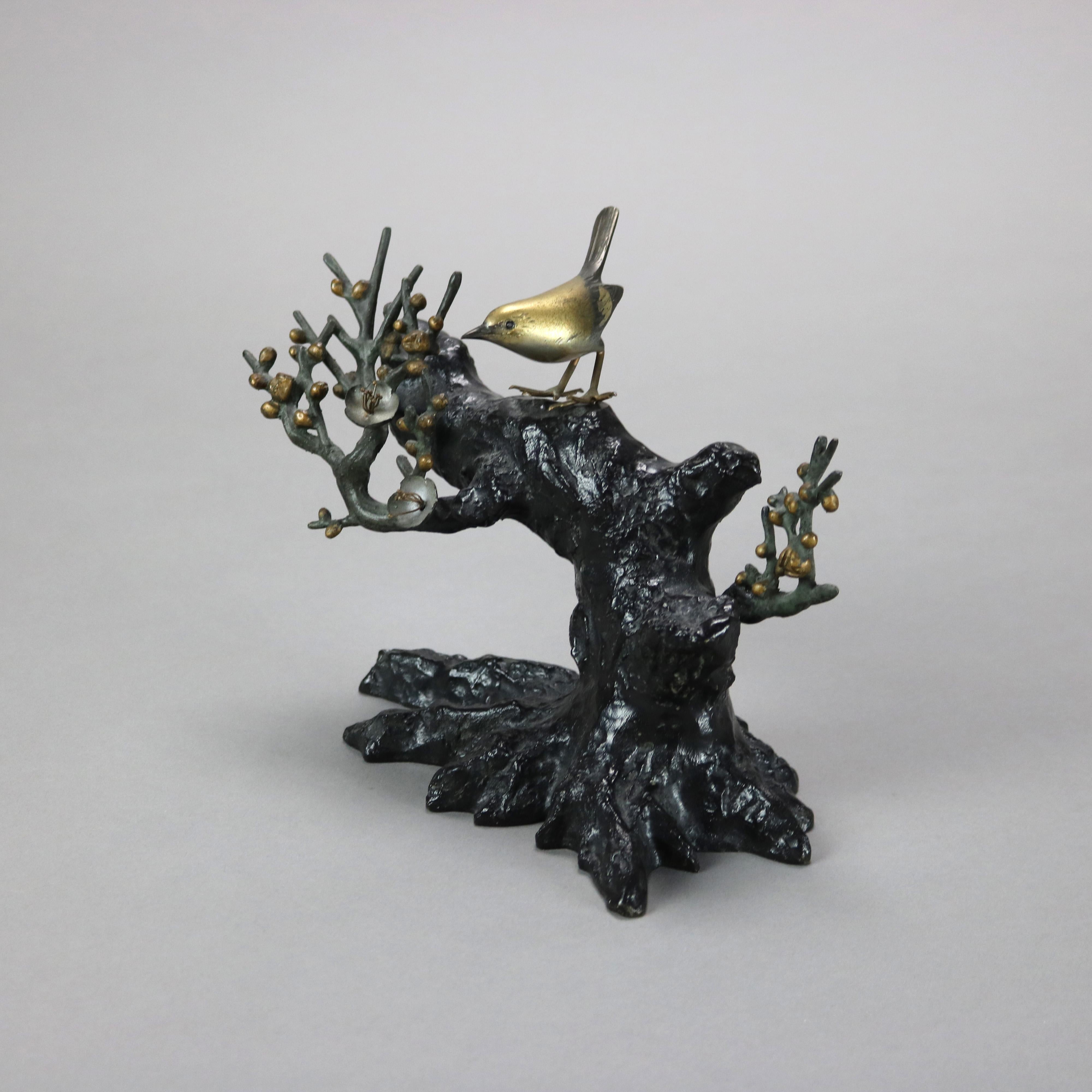 Scultura antica in bronzo di un albero e di un uccello C1900

Misure: 7