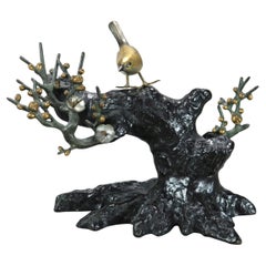 Escultura antigua de bronce de un árbol y un pájaro C1900