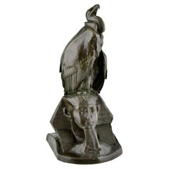 Antique bronze sculpture of a vulture on a sphinx by Cain, France 1851.