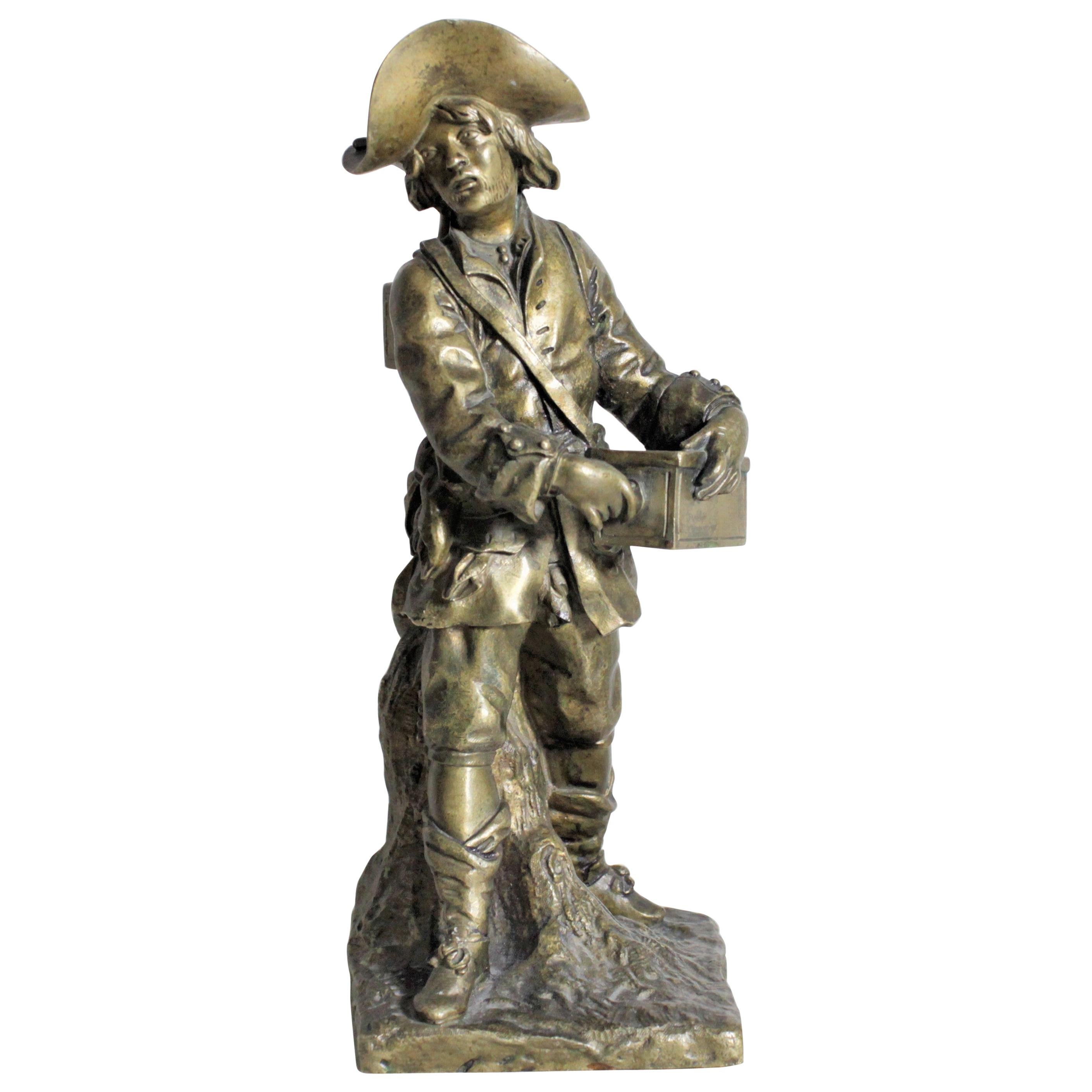 Sculpture en bronze ancienne d'un jeune showman de voyage de l'époque victorienne