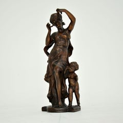 Scultura antica in bronzo di Donna & Child